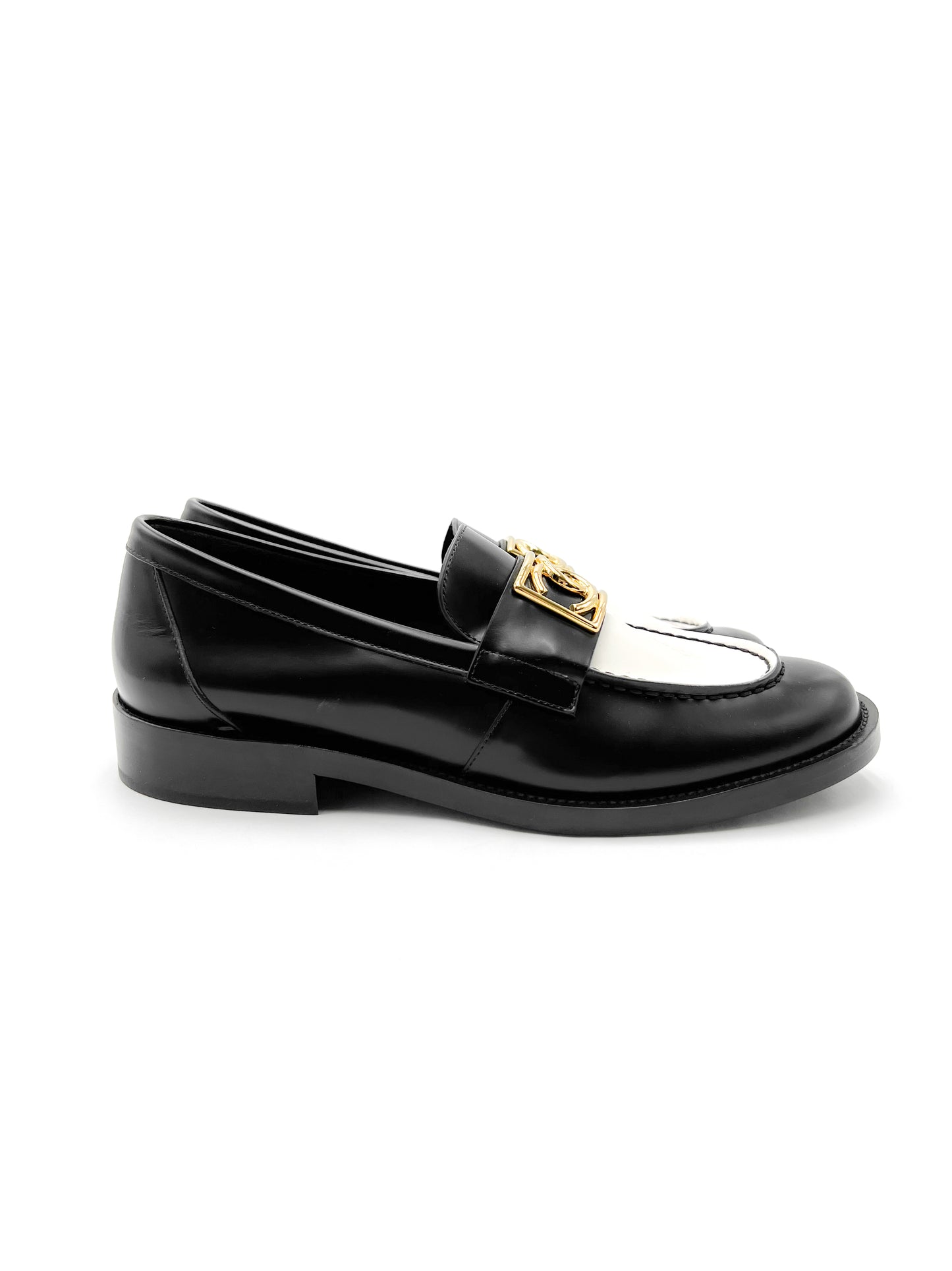 Chanel Black and White Loafers with Gold Hardware