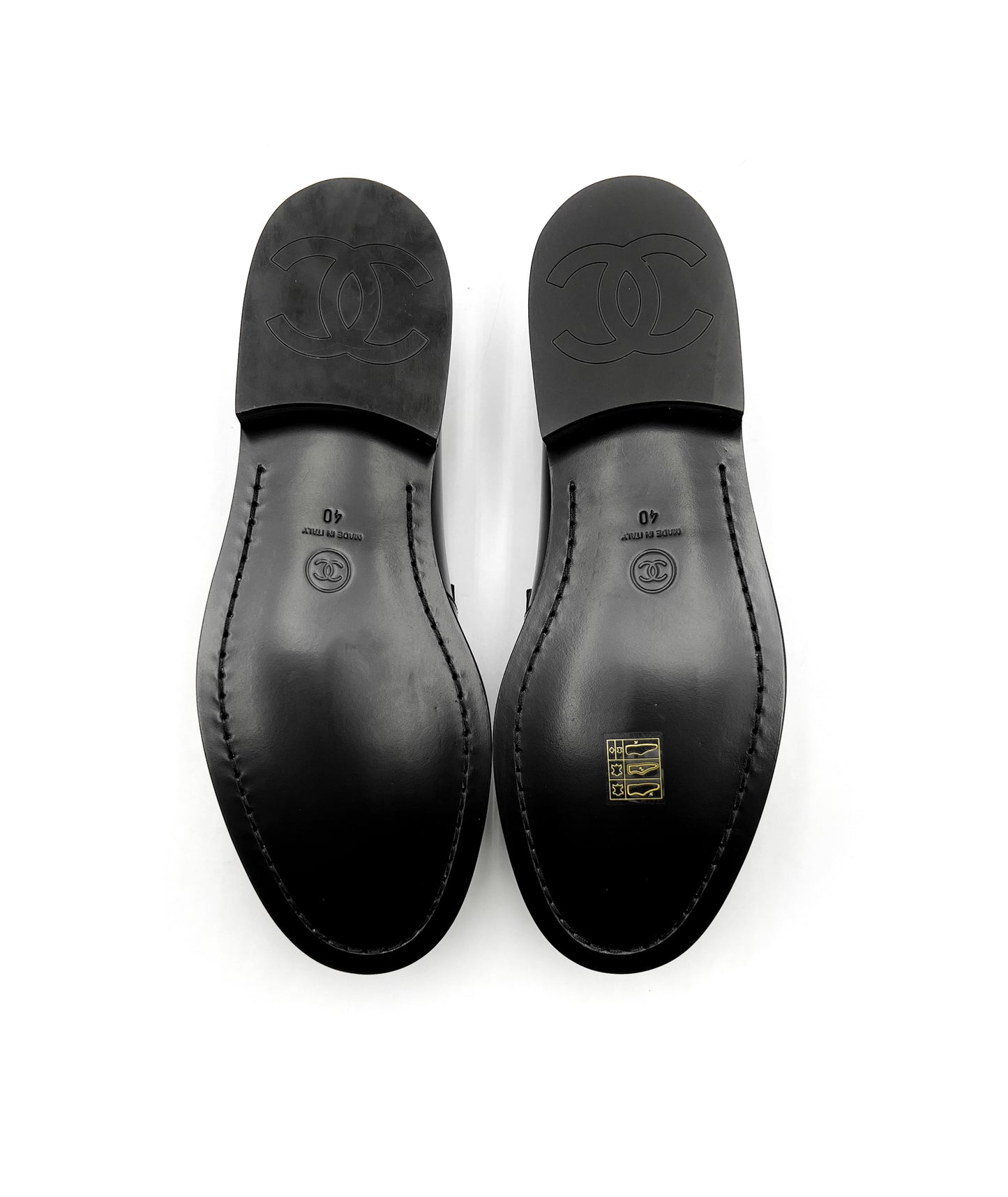 Chanel Black and White Loafers with Gold Hardware